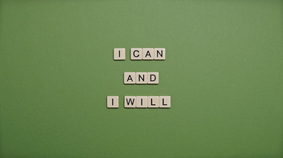 Inspirational message 'I Can and I Will' spelled with tile letters on a green background.