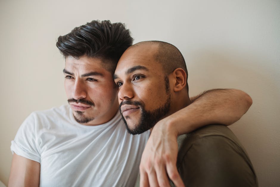 Portrait of a loving couple embracing, showcasing tenderness and connection indoors.