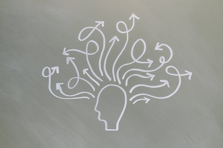 Conceptual chalk drawing illustrating mental health challenges with arrows representing thoughts.