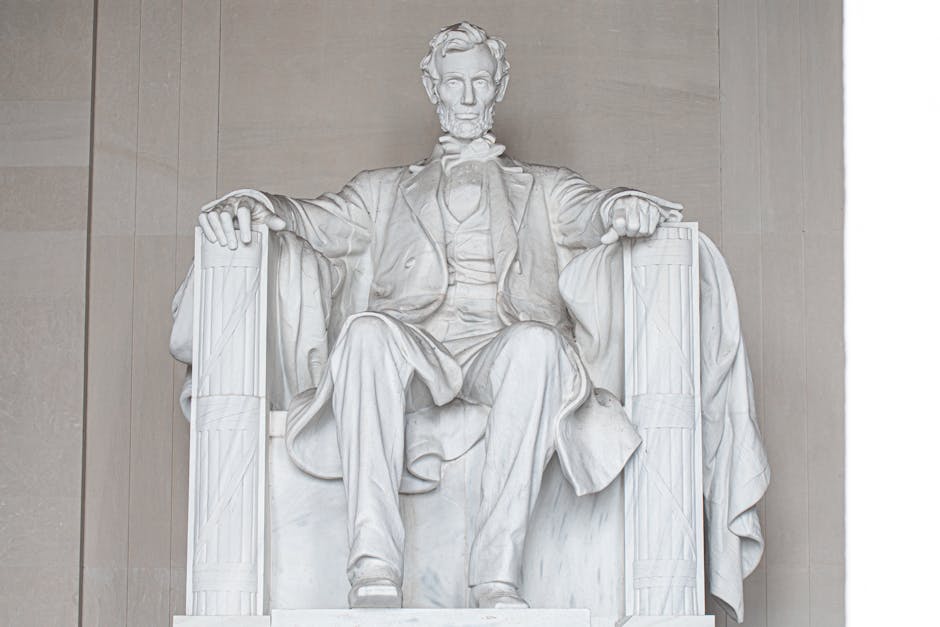 Iconic statue of Abraham Lincoln inside the Lincoln Memorial in Washington DC.