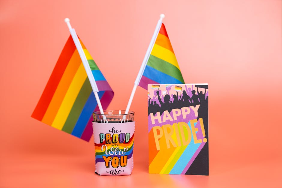 Bright celebrations of LGBTQ+ pride with rainbow flags and inspirational messages against a red backdrop.