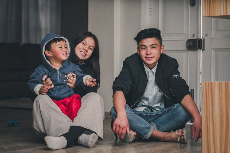 A joyful family enjoying quality time together indoors, featuring warmth and closeness.