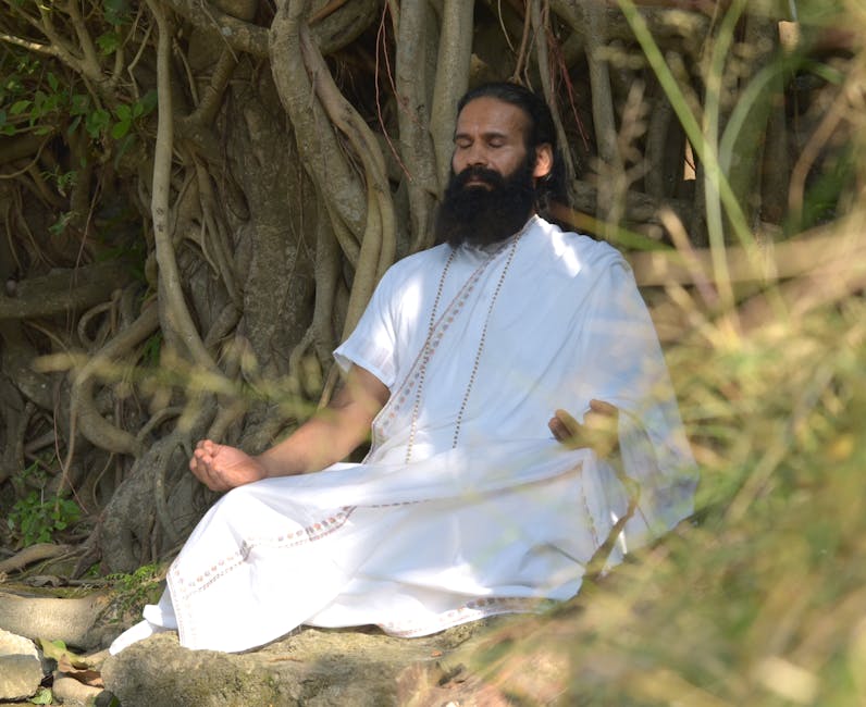 A serene moment of spiritual meditation under a banyan tree in Rishikesh, India.