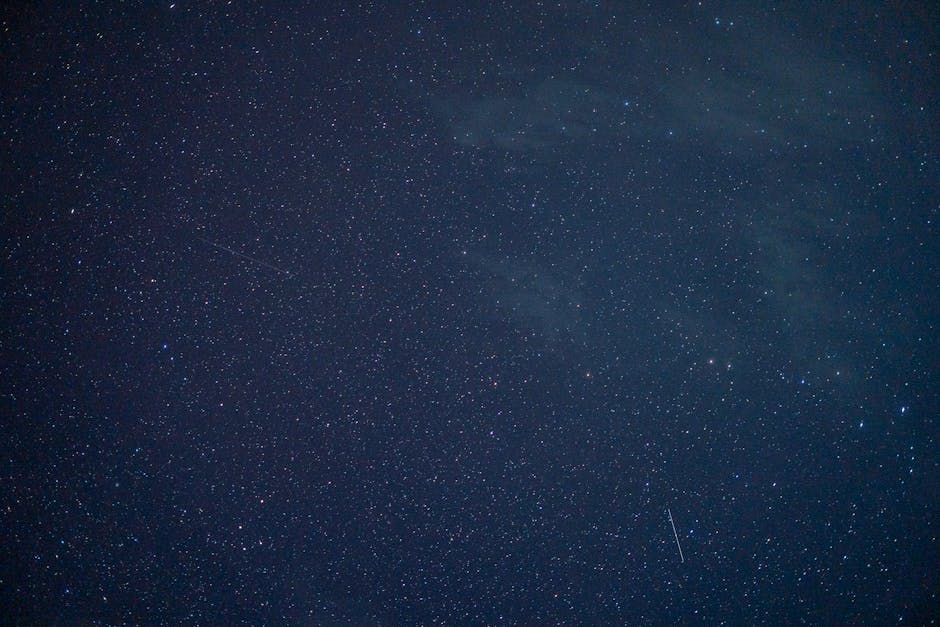 A breathtaking photograph of a clear night sky filled with stars and constellations, ideal for serene backgrounds.