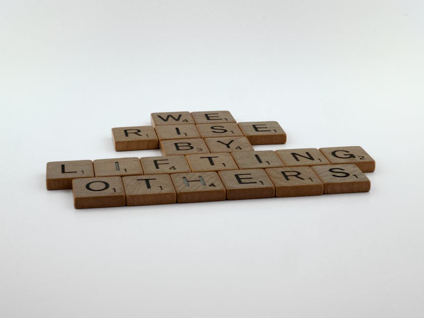 Inspirational message on wooden tiles promoting empowerment and support.