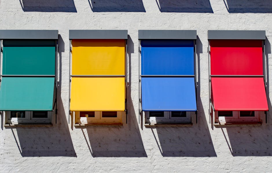 Vibrant awnings in primary colors on a building facade, Donauwörth, Germany.